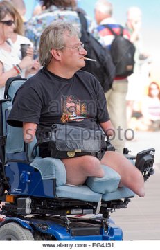 disabled-quadriplegic-wheelchair-supporter-smoking-in-olympic-games-eg4j51
