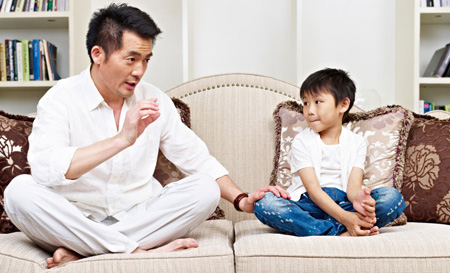 parent-talking-to-child-couch-450px